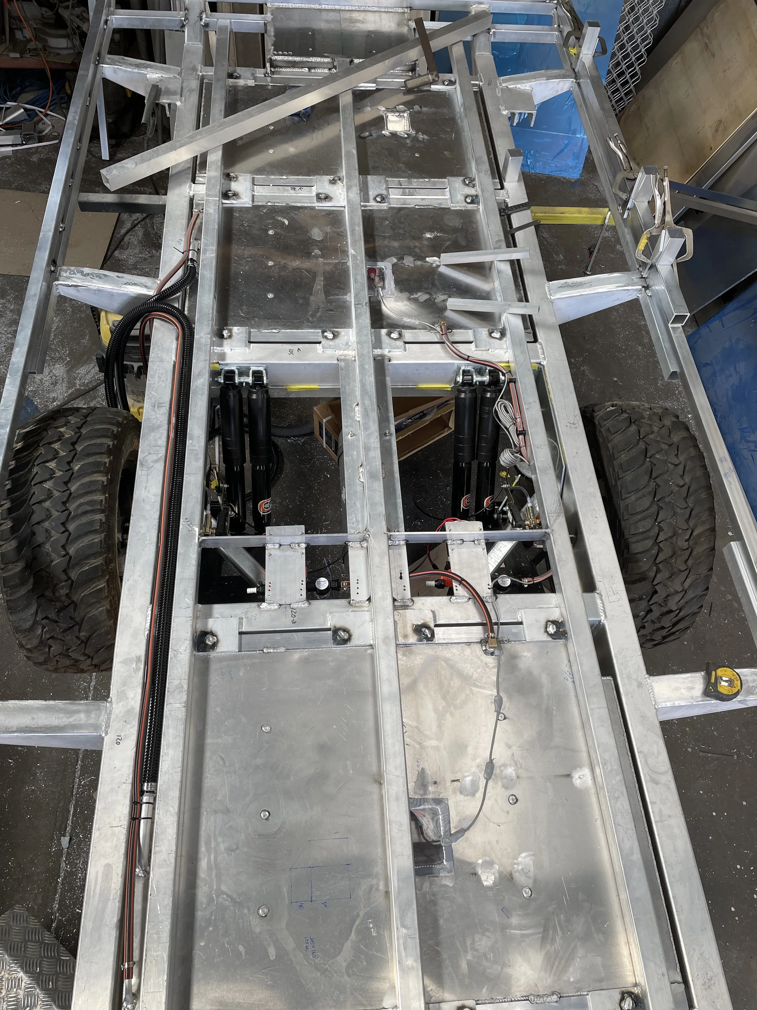 Custom aluminium chassis for a caravan. with offroad wheels built strong