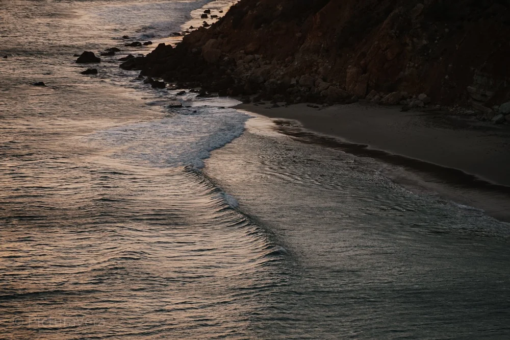 Wellen im Sonnenuntergang