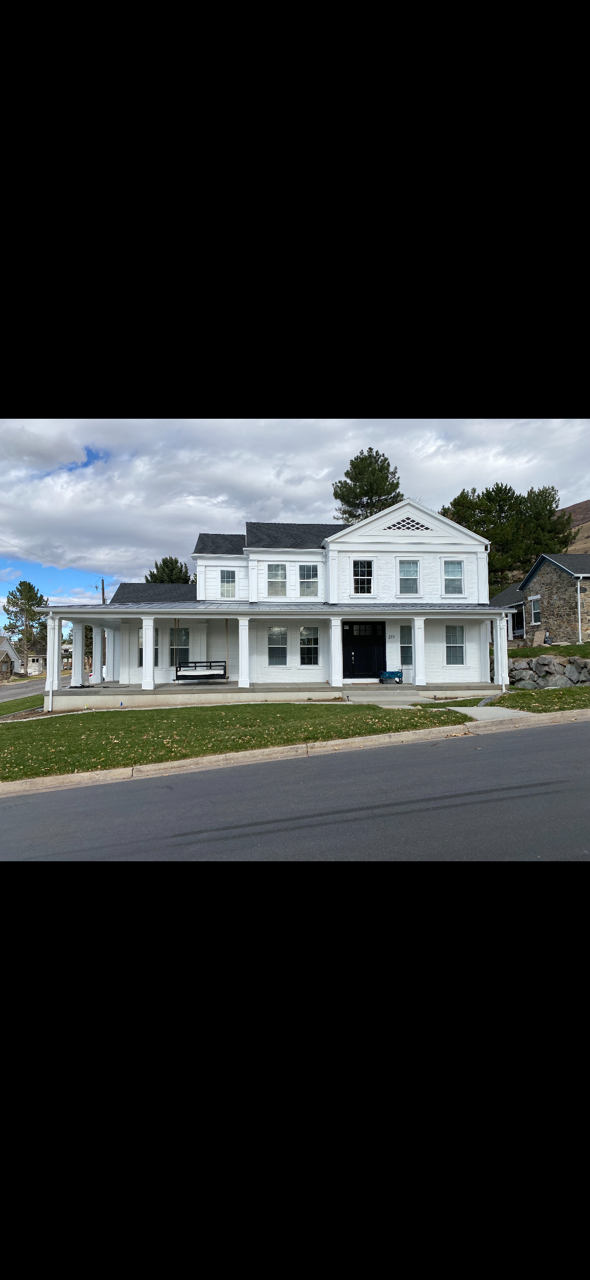 Modern Utah apartment development featuring vertical and horizontal siding, exterior panel systems, custom trim, soffit, and fascia.