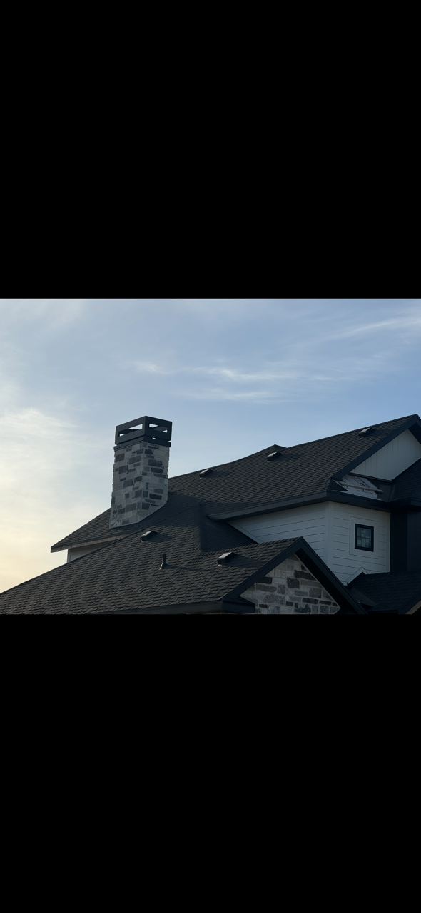 Utah custom home featuring natural stone masonry, horizontal lap siding, custom exterior trim, soffit, fascia, and chimney details.