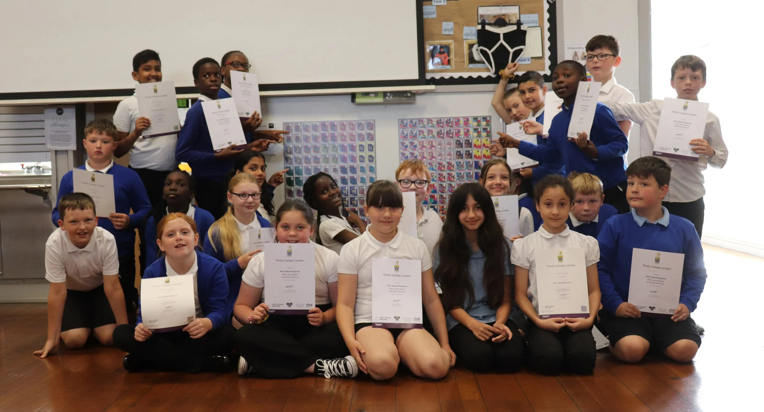 Group Photo around artwork.jpg