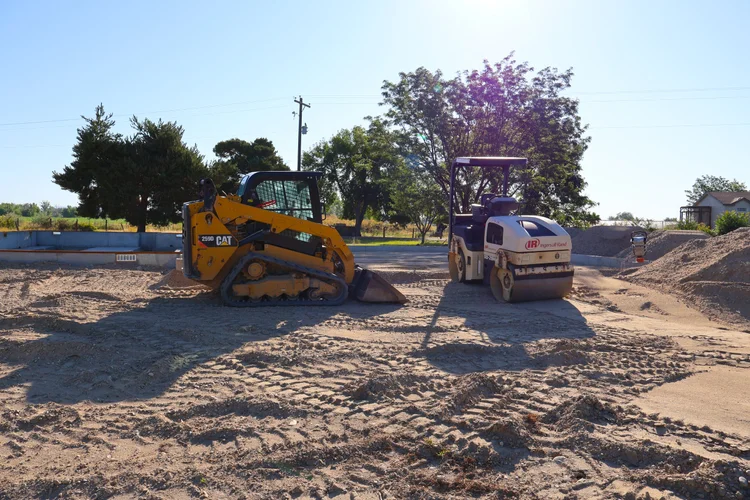 Construction equipment on a site work project