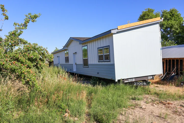 White home elevated on blocks