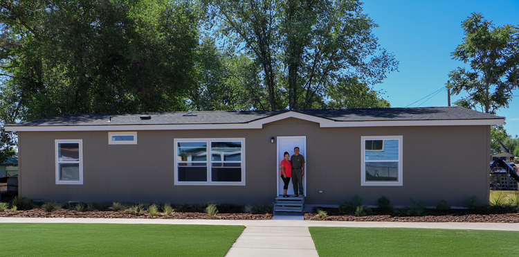Finished home with grass