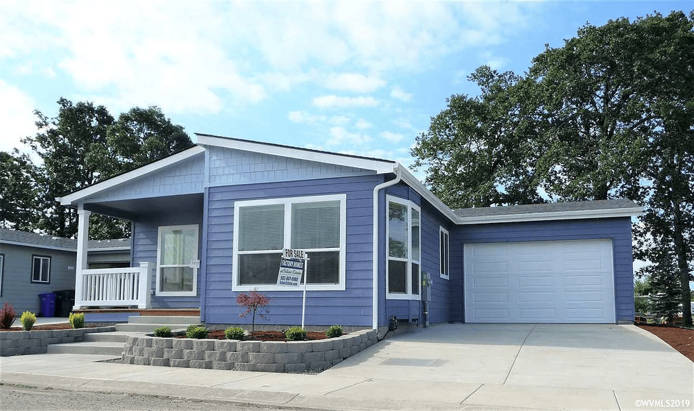 Finished Skyline manufactured home with porch and garage