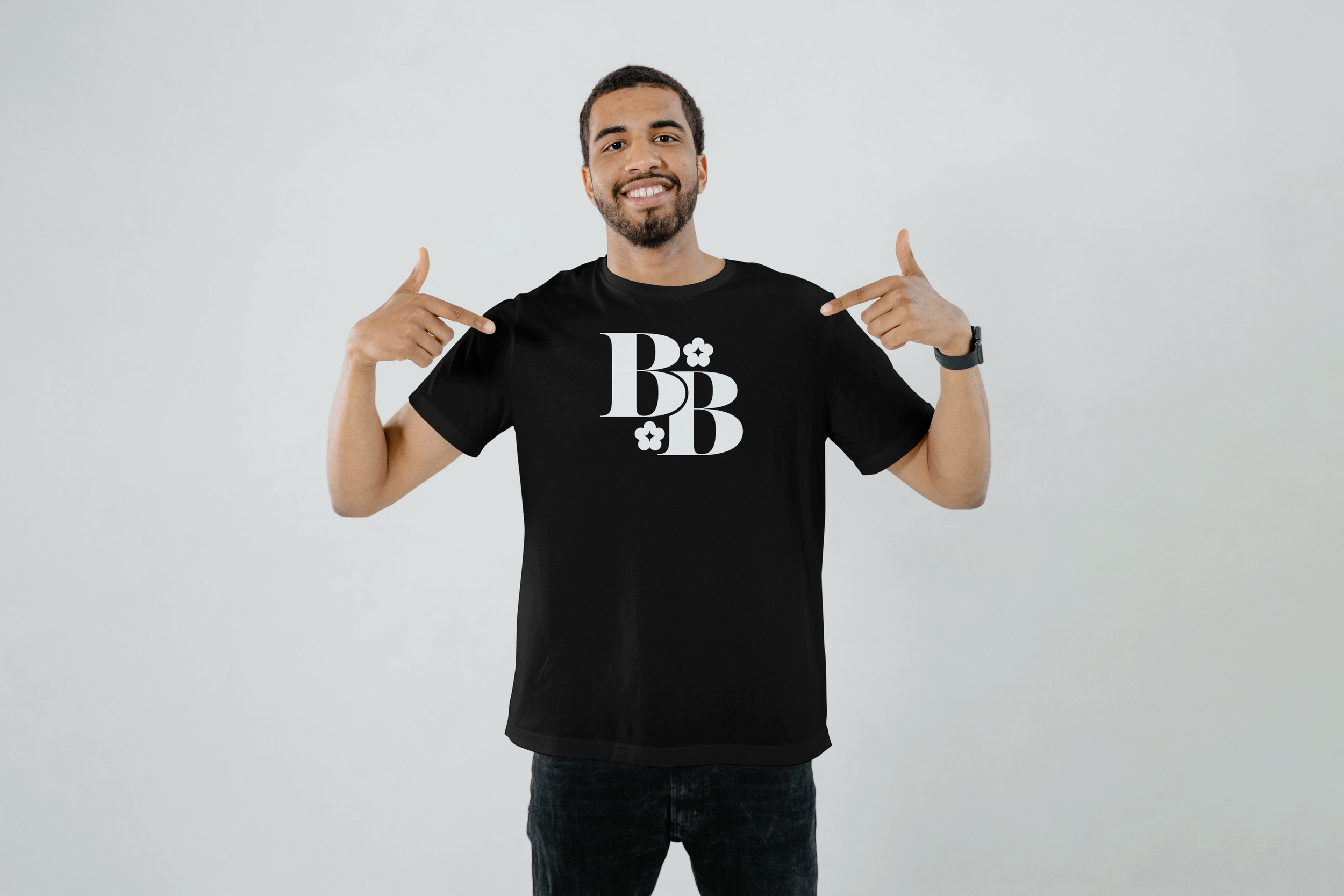 Free Man Wearing T-Shirt Mockup.png