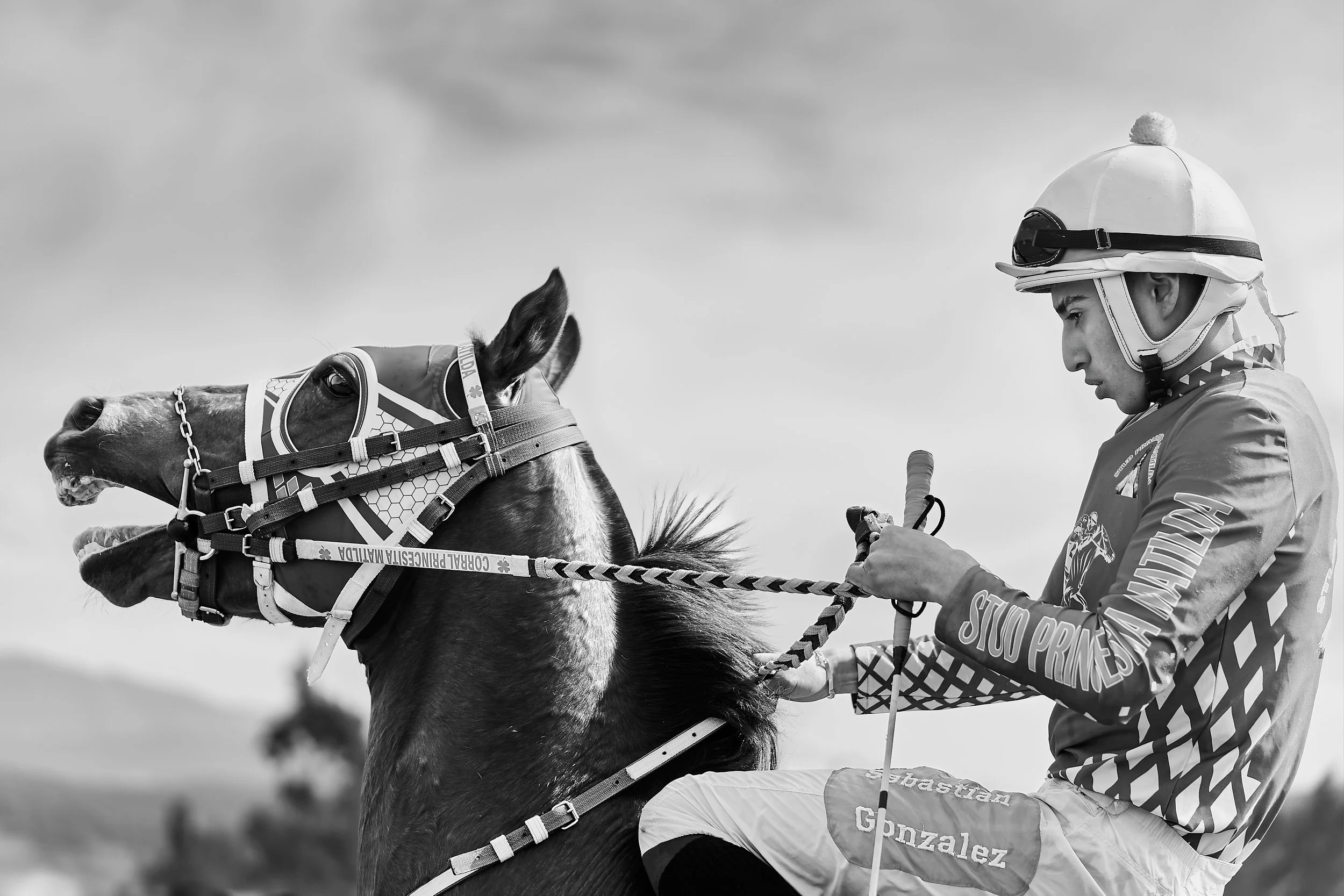 Rider leading his horse.