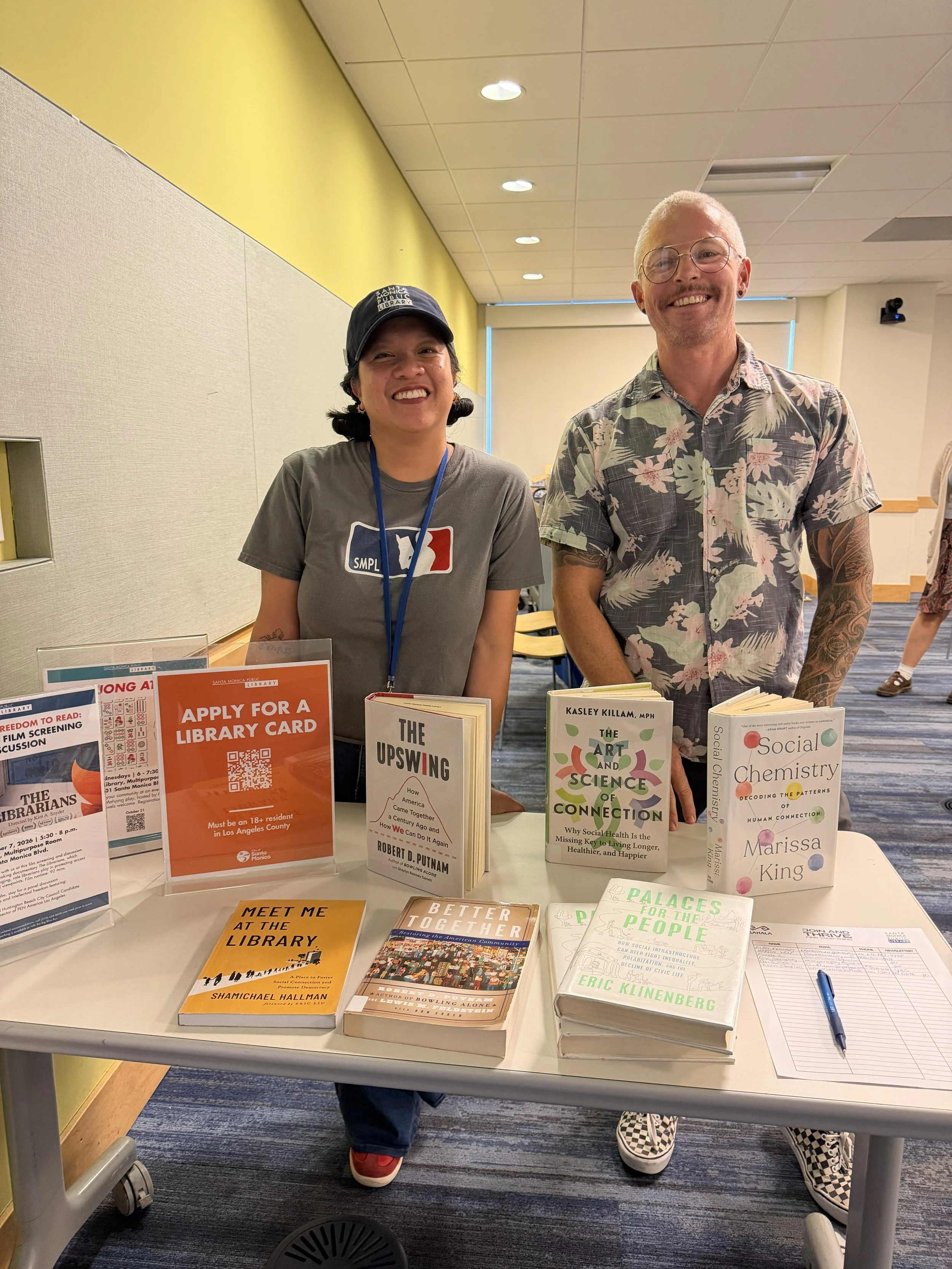 jeff and erica with books upstairs in MPR.jpg