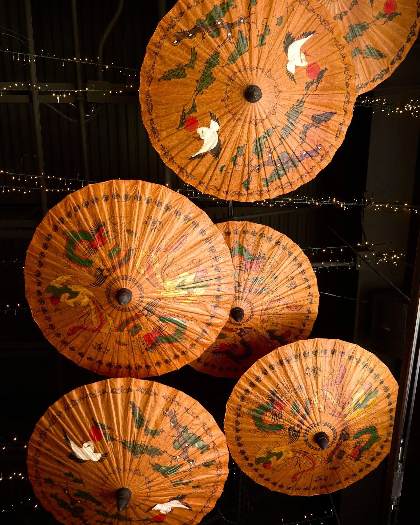 ✨ Look up and let the magic unfold. ✨
At Bendi Wok N Bar, every detail tells a story: from our bold flavors to the art above your head. These hand-painted parasols bring warmth, tradition, and a little wonder to your dining experience in the heart of