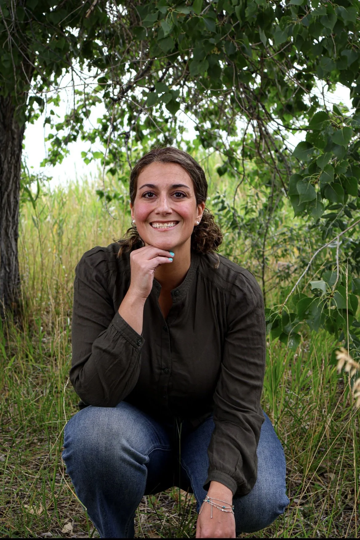Emily at Flourish Together Therapy specializes in supporting individuals navigating trauma, complex trauma, PTSD, major life transitions, grief, anxiety, and depression