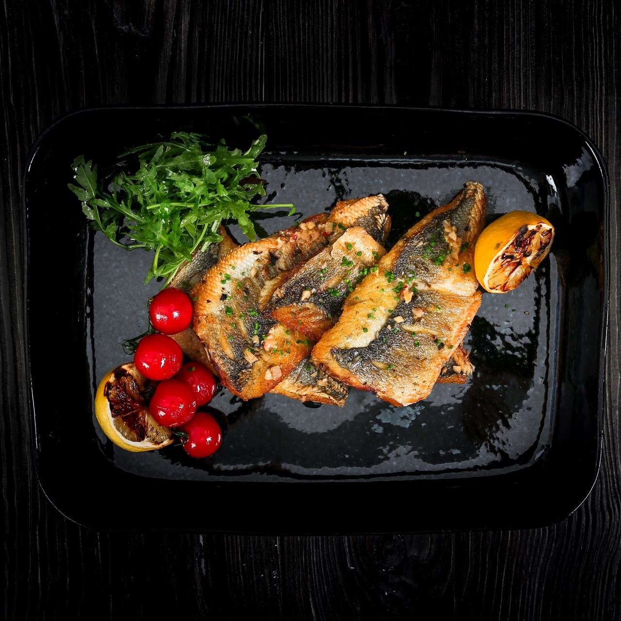 Pan-Seared Sea Bass with Grilled Lemon & Rocket