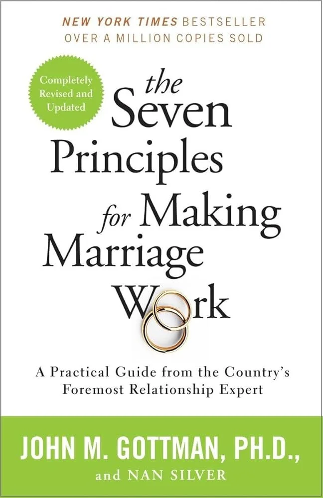 Cover of the book "The Seven Principles for Making Marriage Work" by John M. Gottman, Ph.D., and Nan Silver, featuring a green badge indicating it's a completely revised and updated edition, and with an image of two wedding rings.