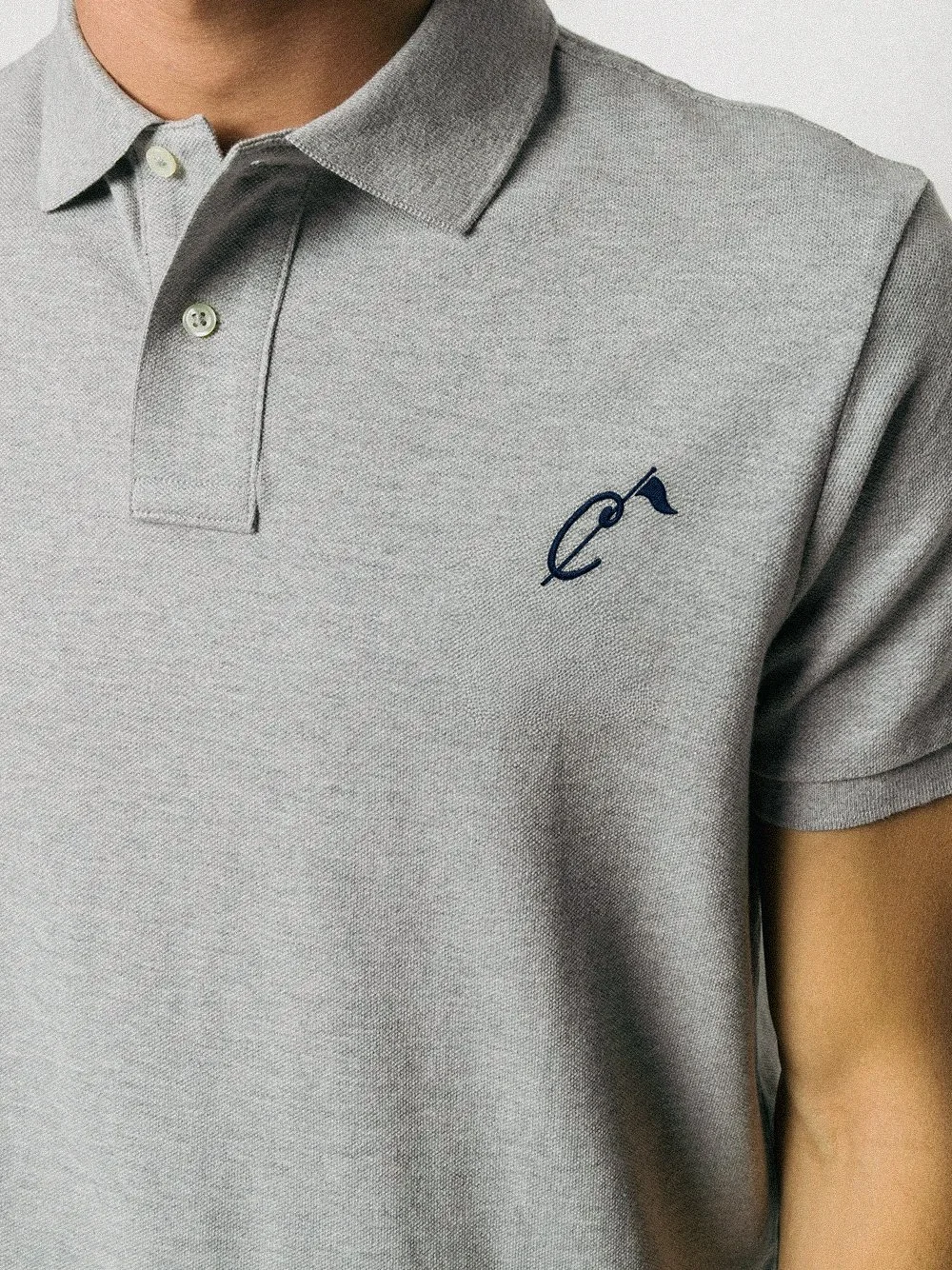 polo-tee-mockup-campus.jpg
