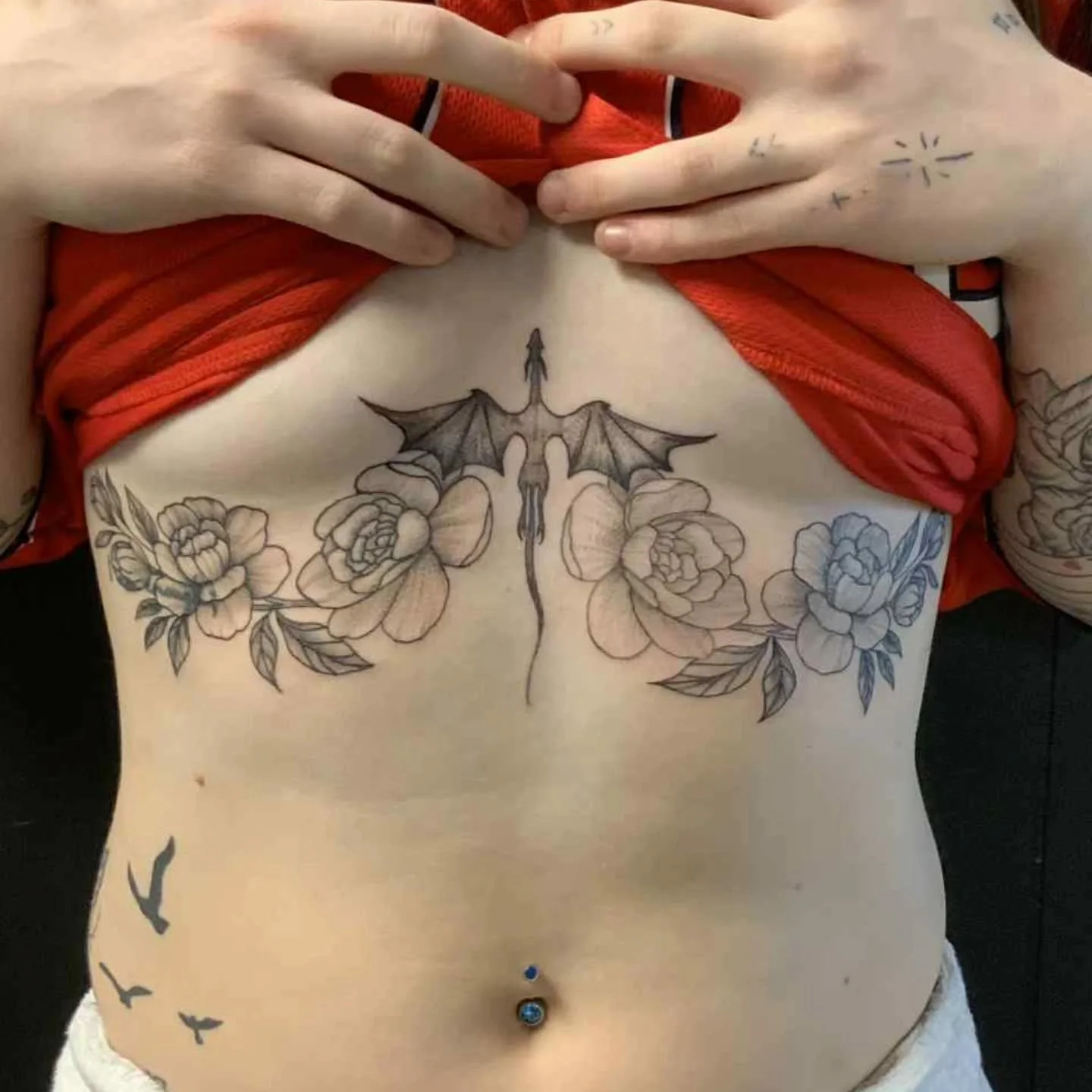 Cute Floral with a Dragon piece by Chera!

709 W. Sunshine St. Springfield, MO 65807
(417) 590-4399