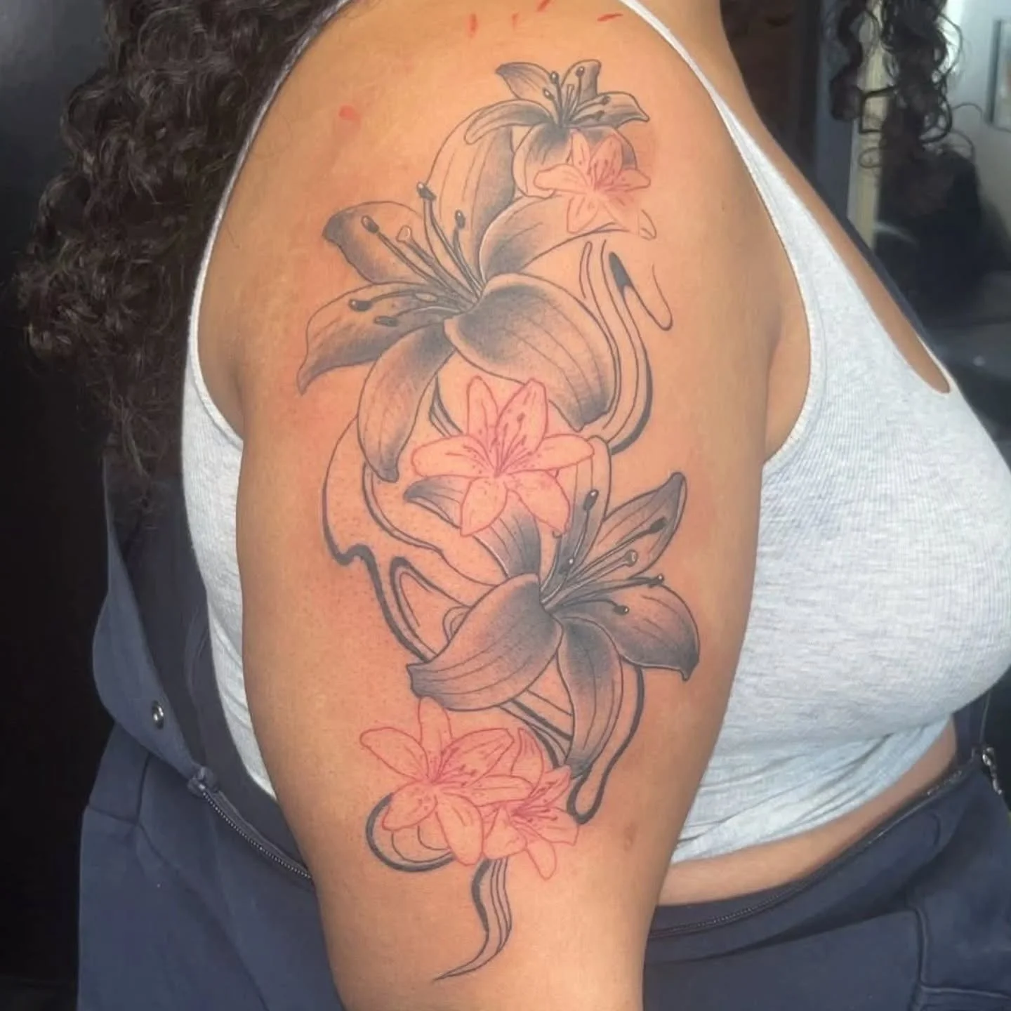 Black and red lily piece by Larry.

709 W. Sunshine St. Springfield, MO 65807
(417) 590-4399