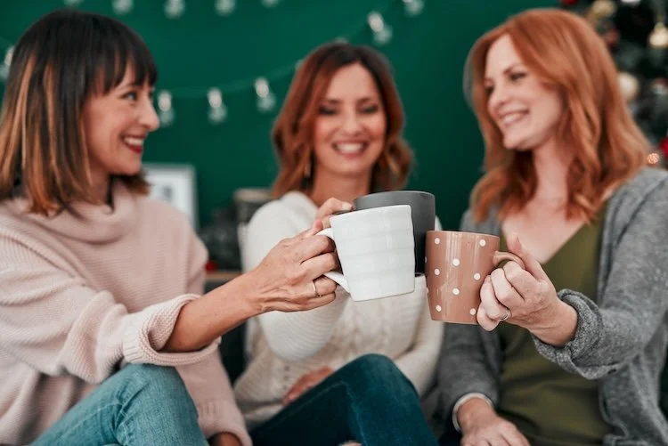 Group of confident women celebrating clinking mugs. Gentle Joy Sensitive Women's Leadership Collective with Lori Cangilla from Singularly Sensitive