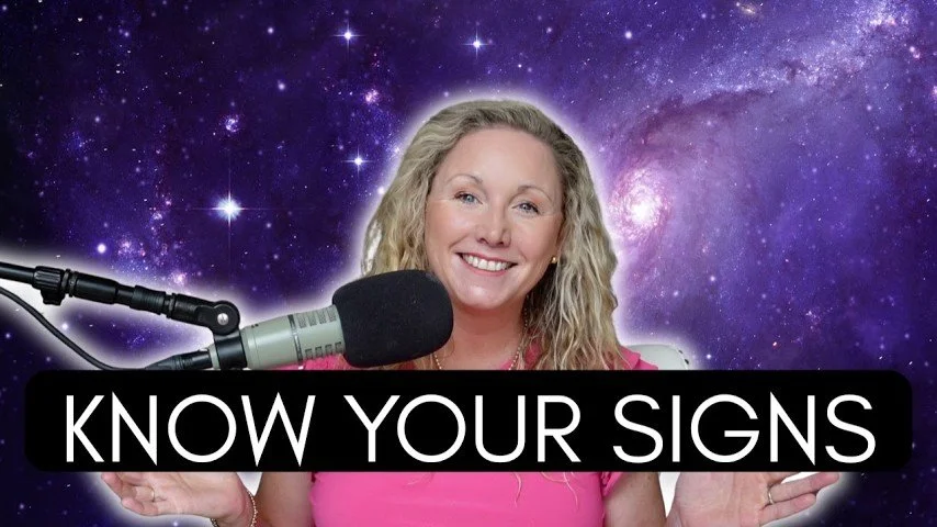 A woman with blonde curly hair smiling at the camera, speaking into a microphone, with a cosmic background of stars and purple galaxy, and the text 'Know Your Signs' in bold black and white letters.