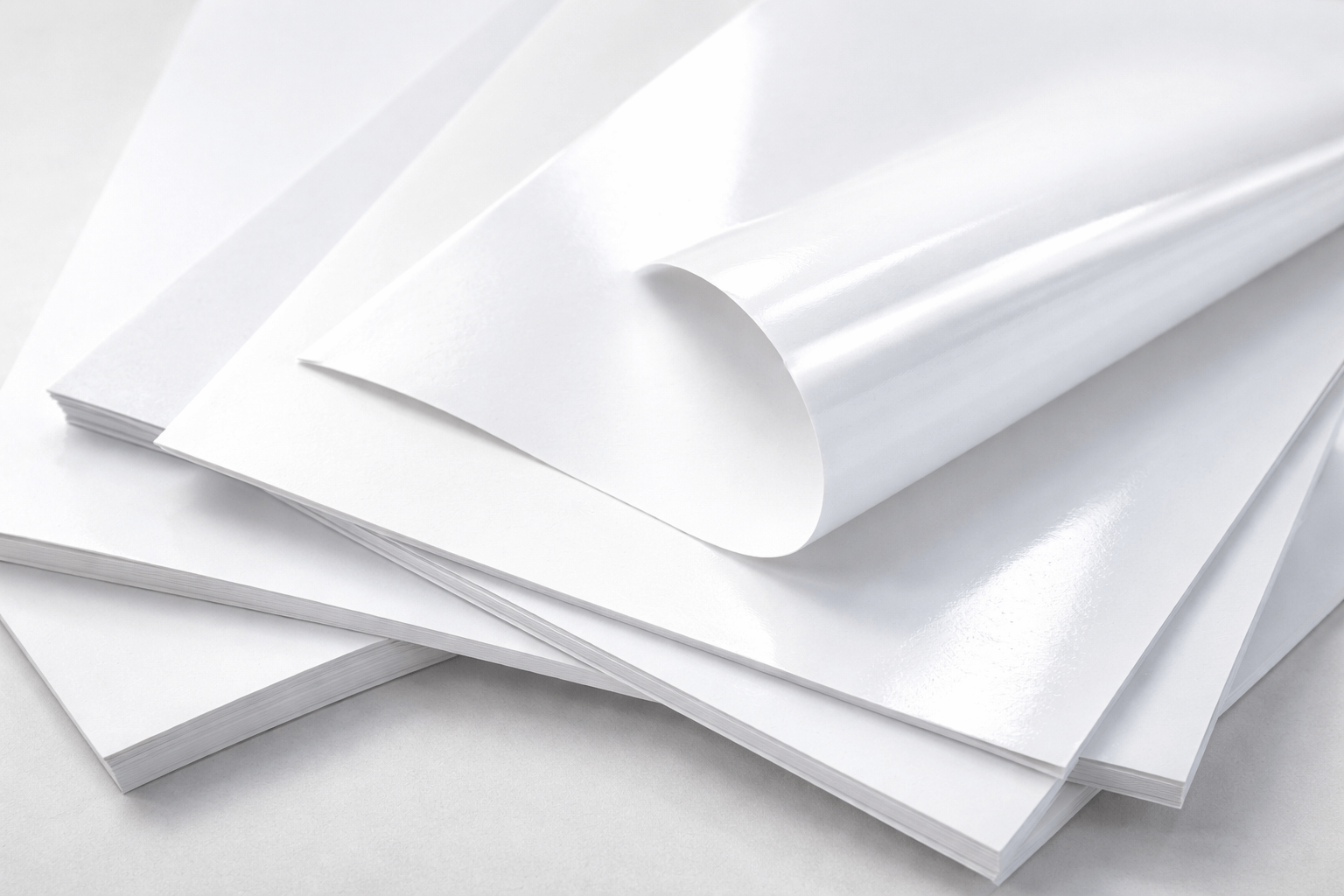 Sheets of coated paper.