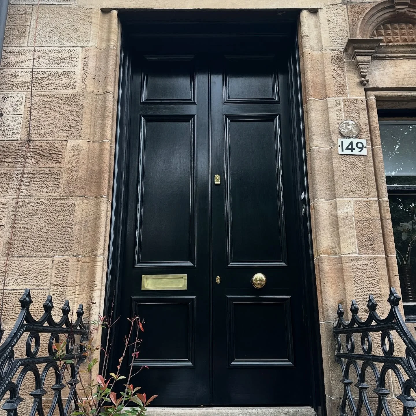Most recent of storm doors (and front door, but I locked it up and posted the key before I took a picture didn&rsquo;t I #blessed)

Big doors. Polished brass ironmongery. No messing about. 

Not sure if there&rsquo;s anyone into the buildings/archite