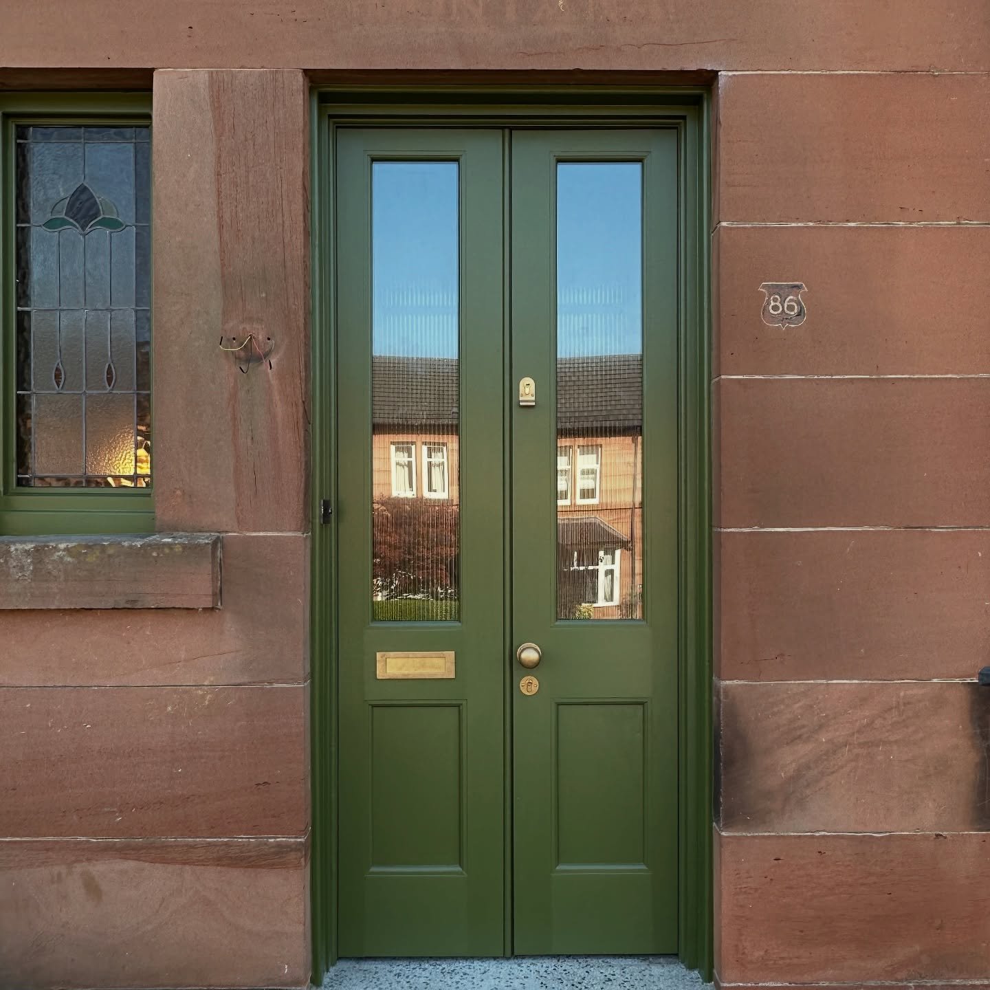 The most recent set of doors we fitted at the start of the week. 
On a lot of the houses there&rsquo;s these windows to the side of the doors, we made a new frame for that then swapped over the stained glass too. 
Turned out great and suits the house
