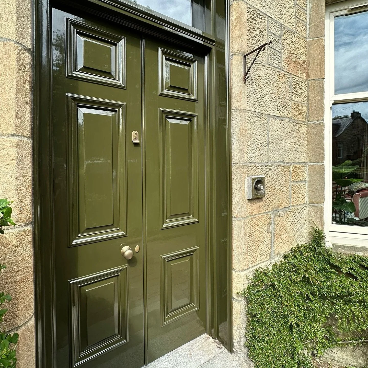 A super glossy set of storm doors fitted over in the Southside. We love how these turned out, they suit the house great. 

A lot of nice hanging baskets out there right now 💐

The colour on these is &ldquo;Invisible Green&rdquo; by @littlegreenepain