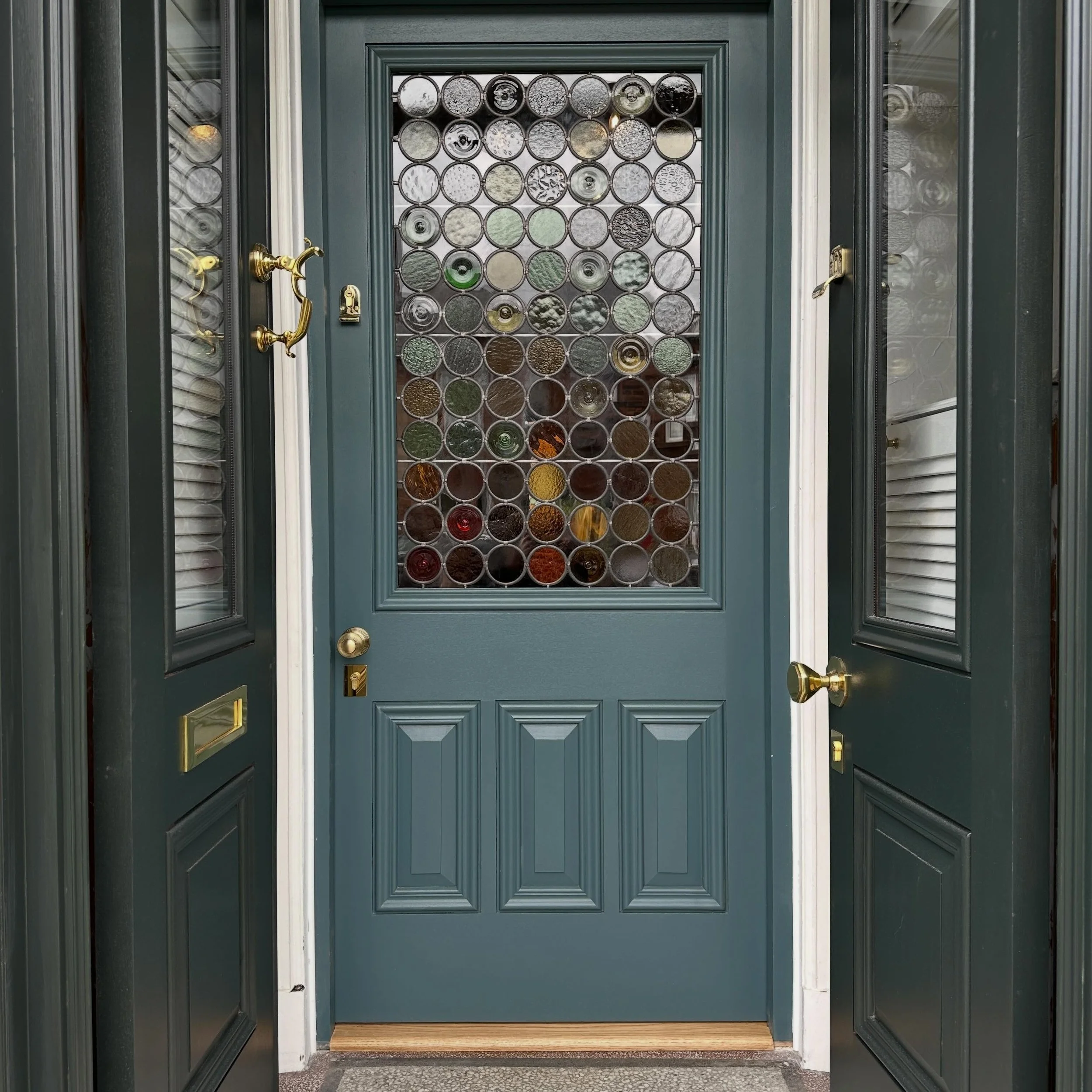 Wow, we love how this gorgeous set turned out. Our customer went for both storm doors and front door. 

Front door is painted in Inchyra Blue by @farrowandball with polished brass hardware and stunning stained glass as always by @__tmac 

Our current