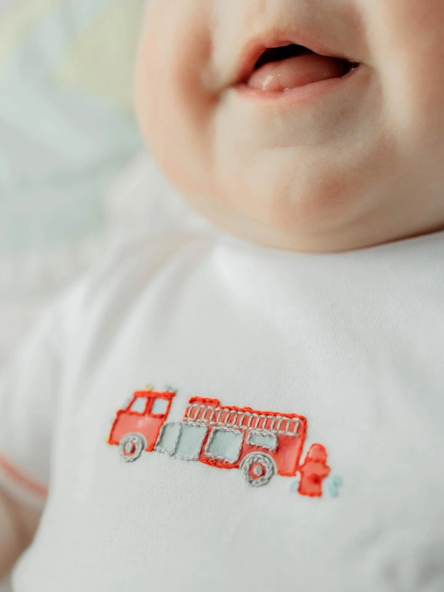 4 months of our handsome &amp; happy boy!!! He is babbling, laughing, &amp; just so much fun! I love being your mama, Charlie 🚒🥰&hearts;️