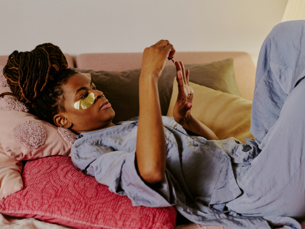 A woman sitting quietly at home resting after emotional burnout and chronic stress from anxiety and overwhelm