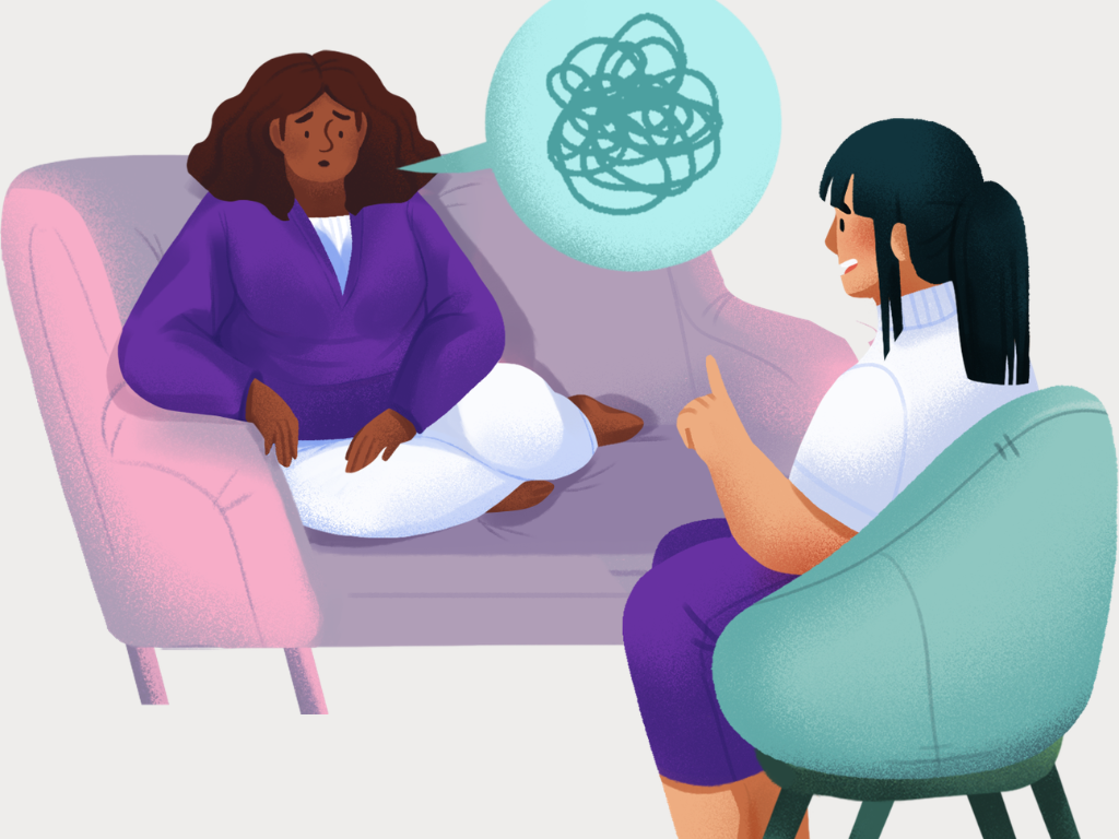 Woman having an honest conversation with her therapist in a comfortable office