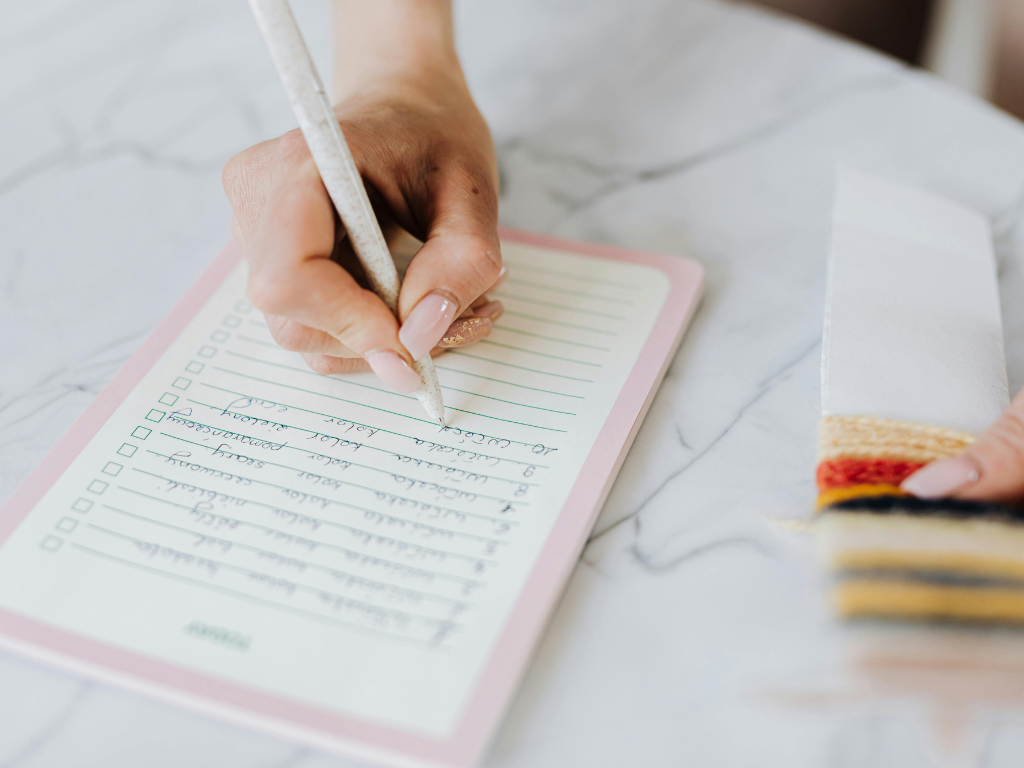 Woman checking her calendar before agreeing to another responsibility