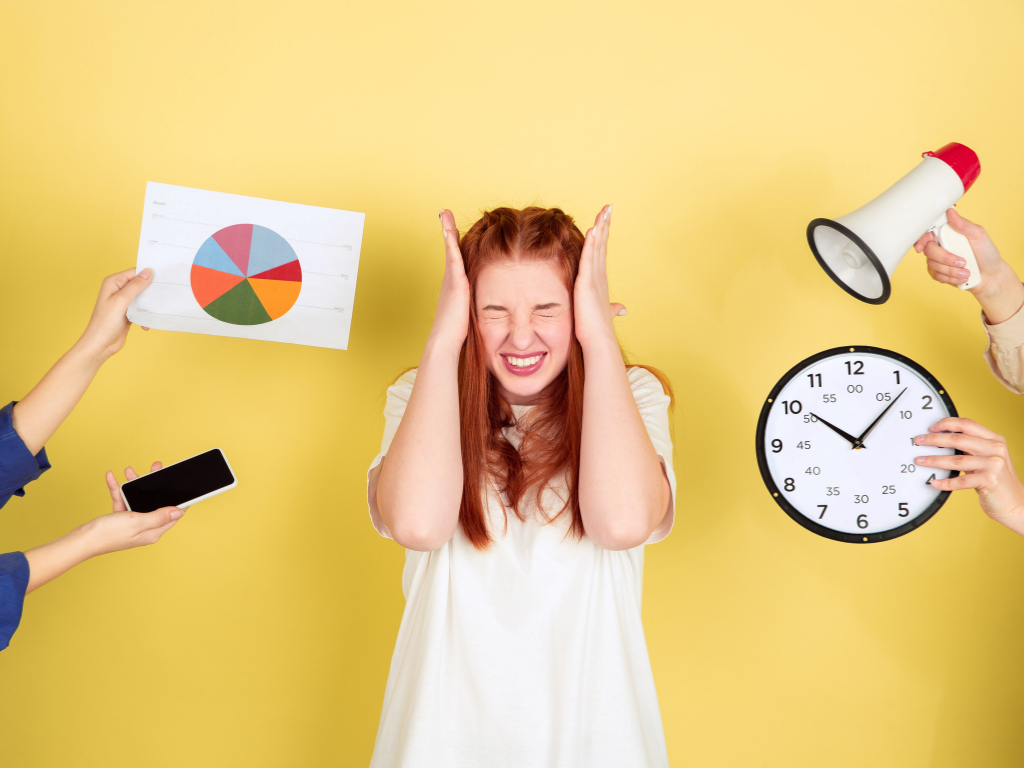 A person looking stressed but empowered as they decide to set boundaries and say no to others.