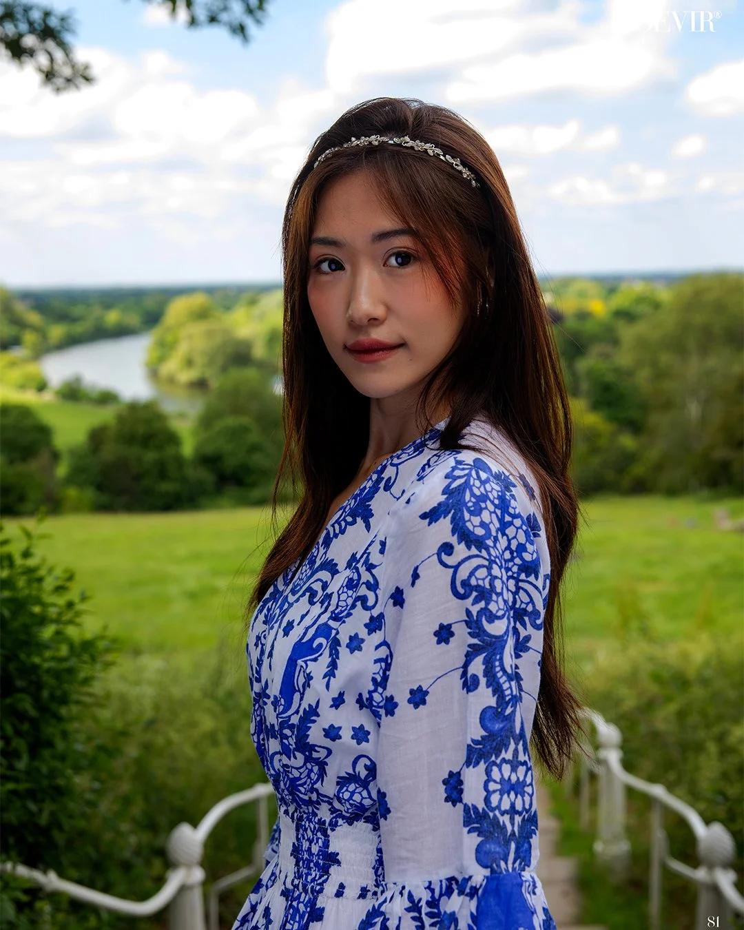 Young asian woman in a blue and white floral dress with beautiful natural makeup