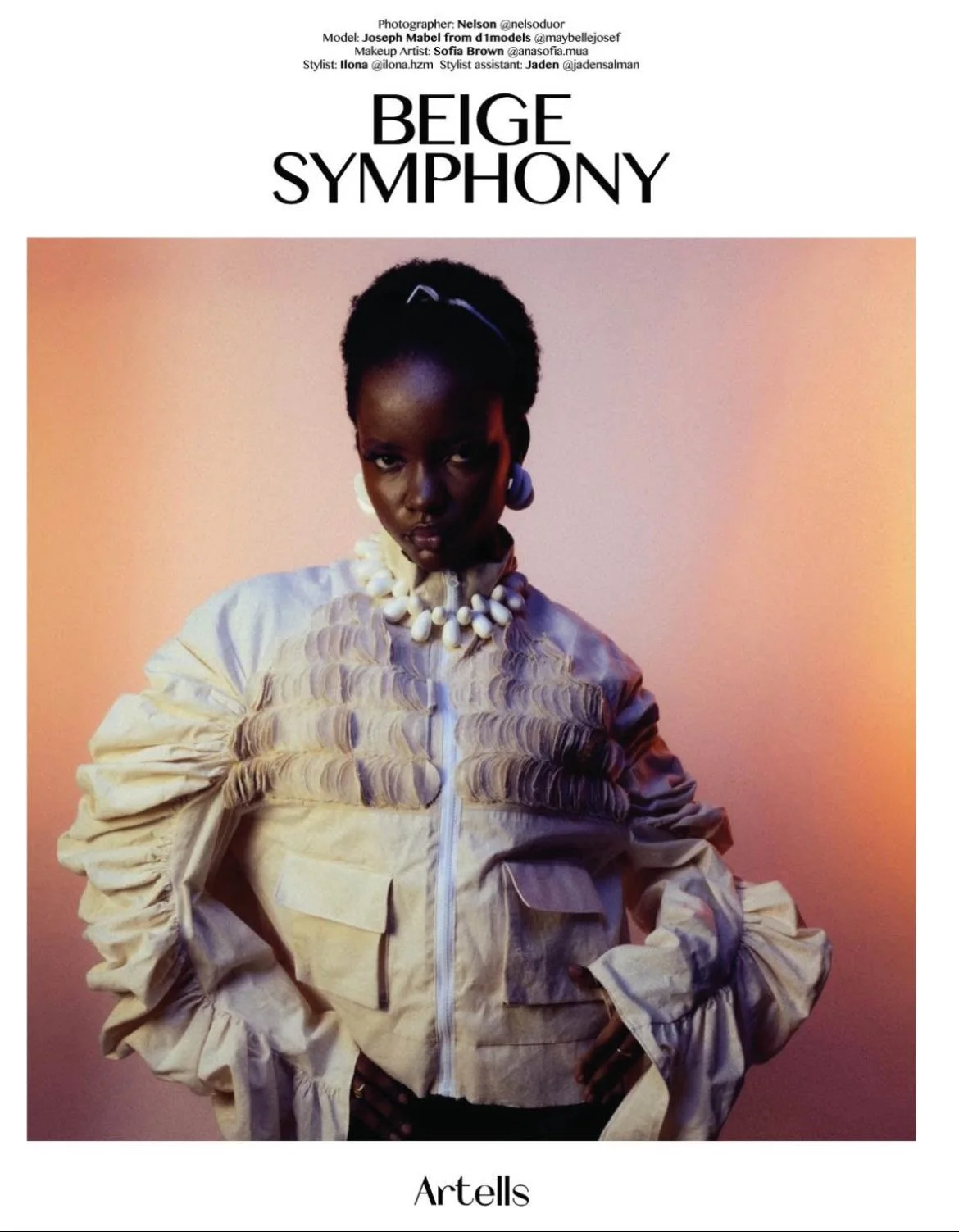 Young dark skin woman in a material jacket. pink eyeshadow. Front cover of the Artells Magazine 