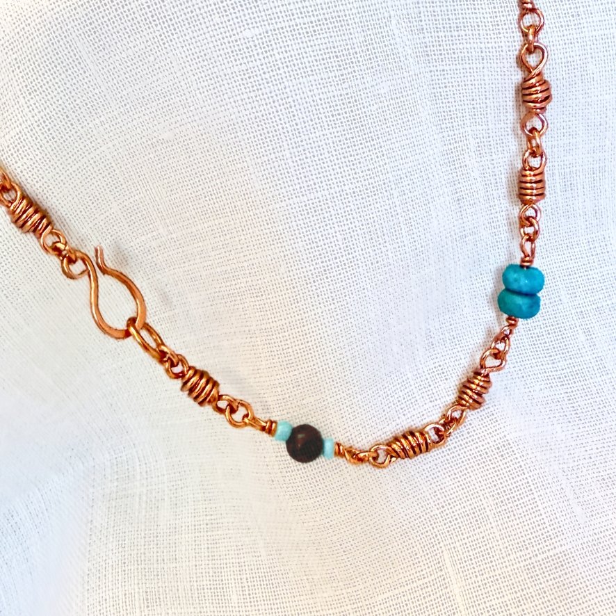 West Texas Sunset Copper and Beaded Necklace close up on light background