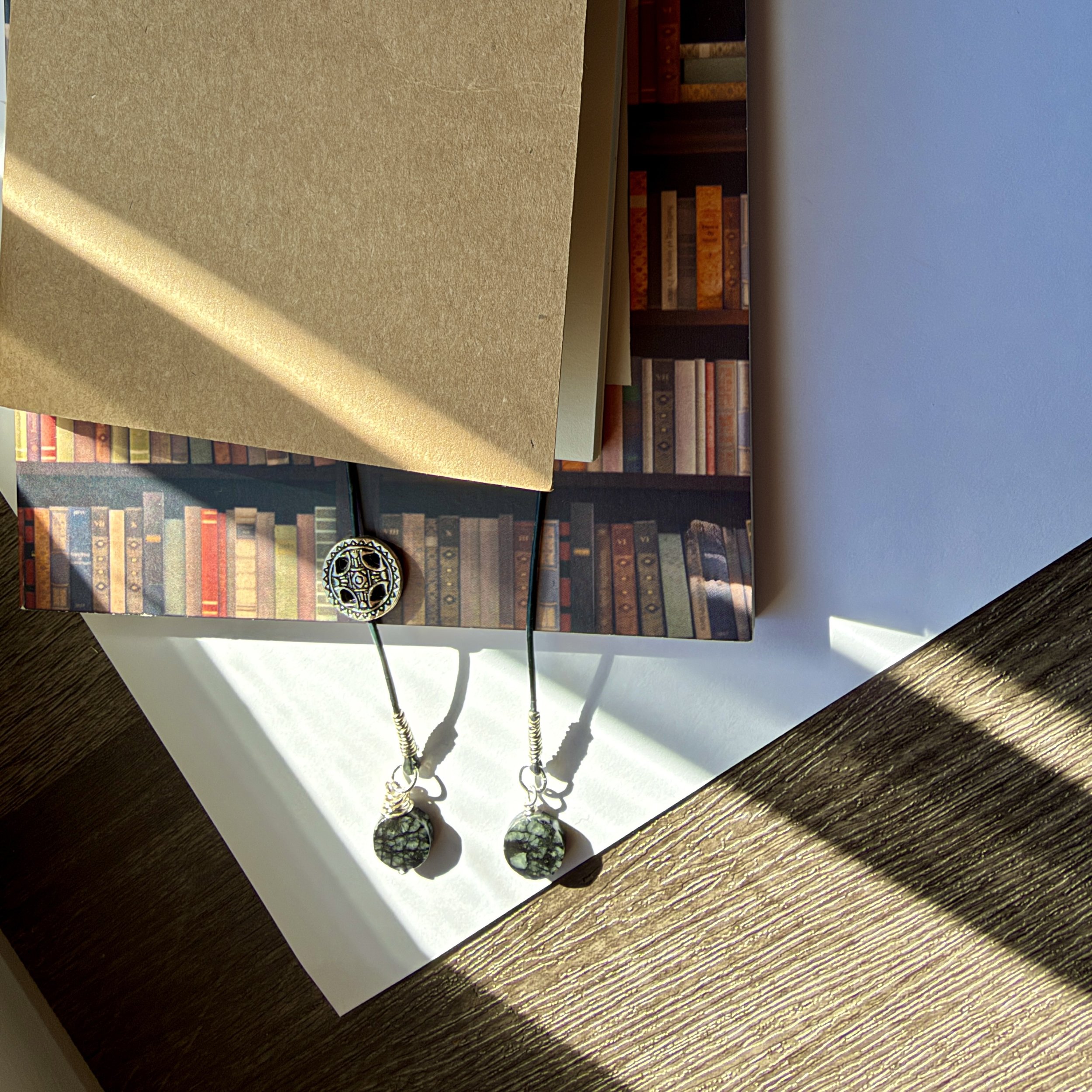 Charcoal navy leather cord and marbled serpentine bookmark with silver accents