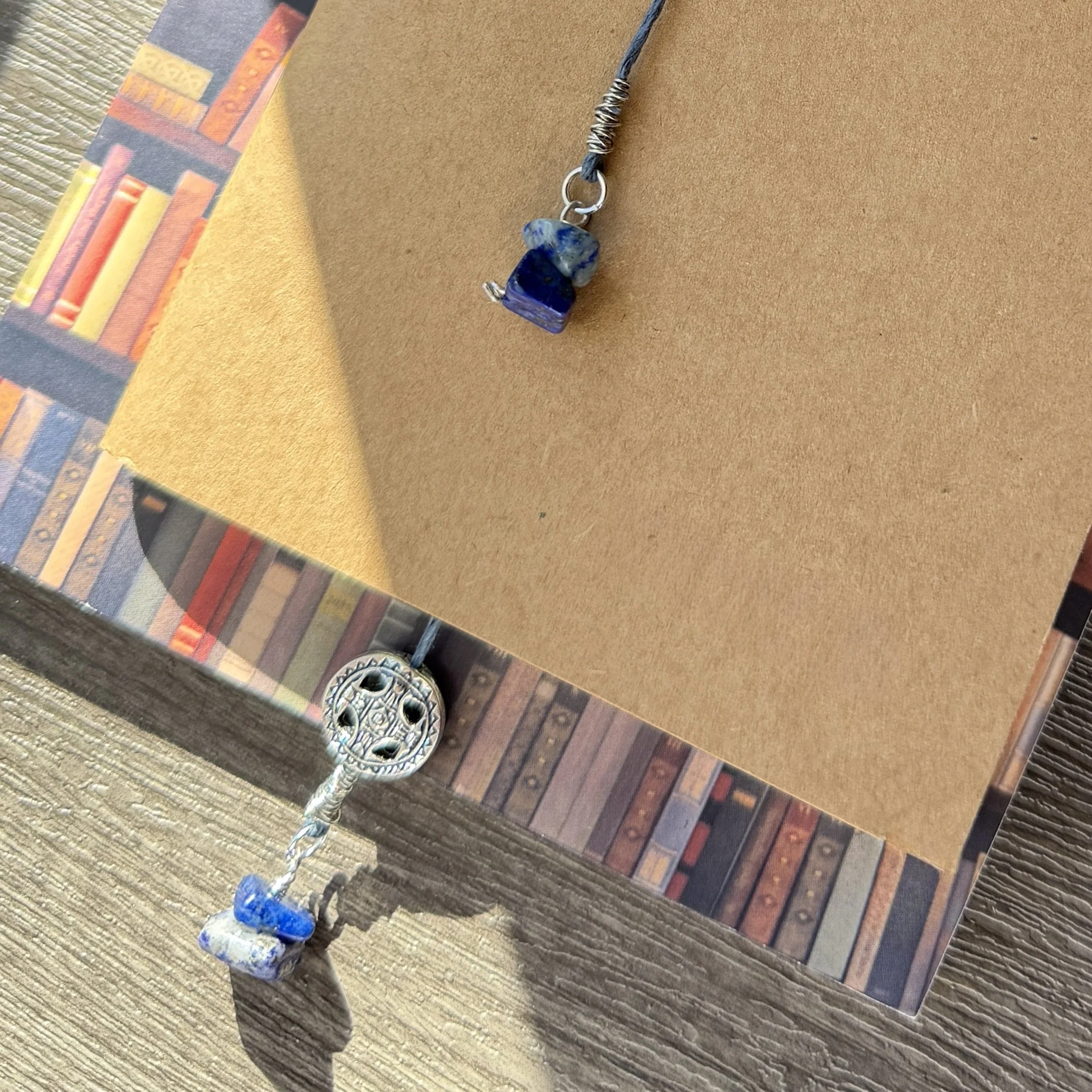 Slate blue hemp cord and lapis lazuli bookmark with silver accents