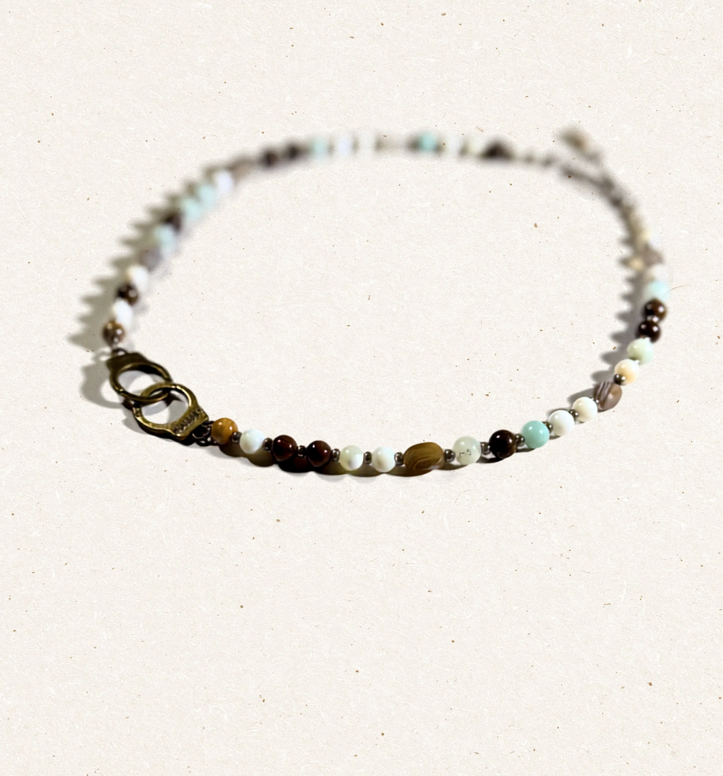 Freedom Beaded Necklace close up blurred.jpg