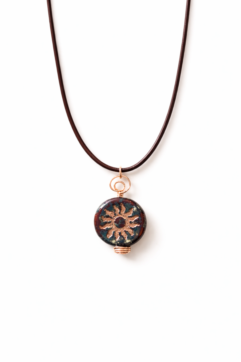 copper sun burst necklace white backround.png