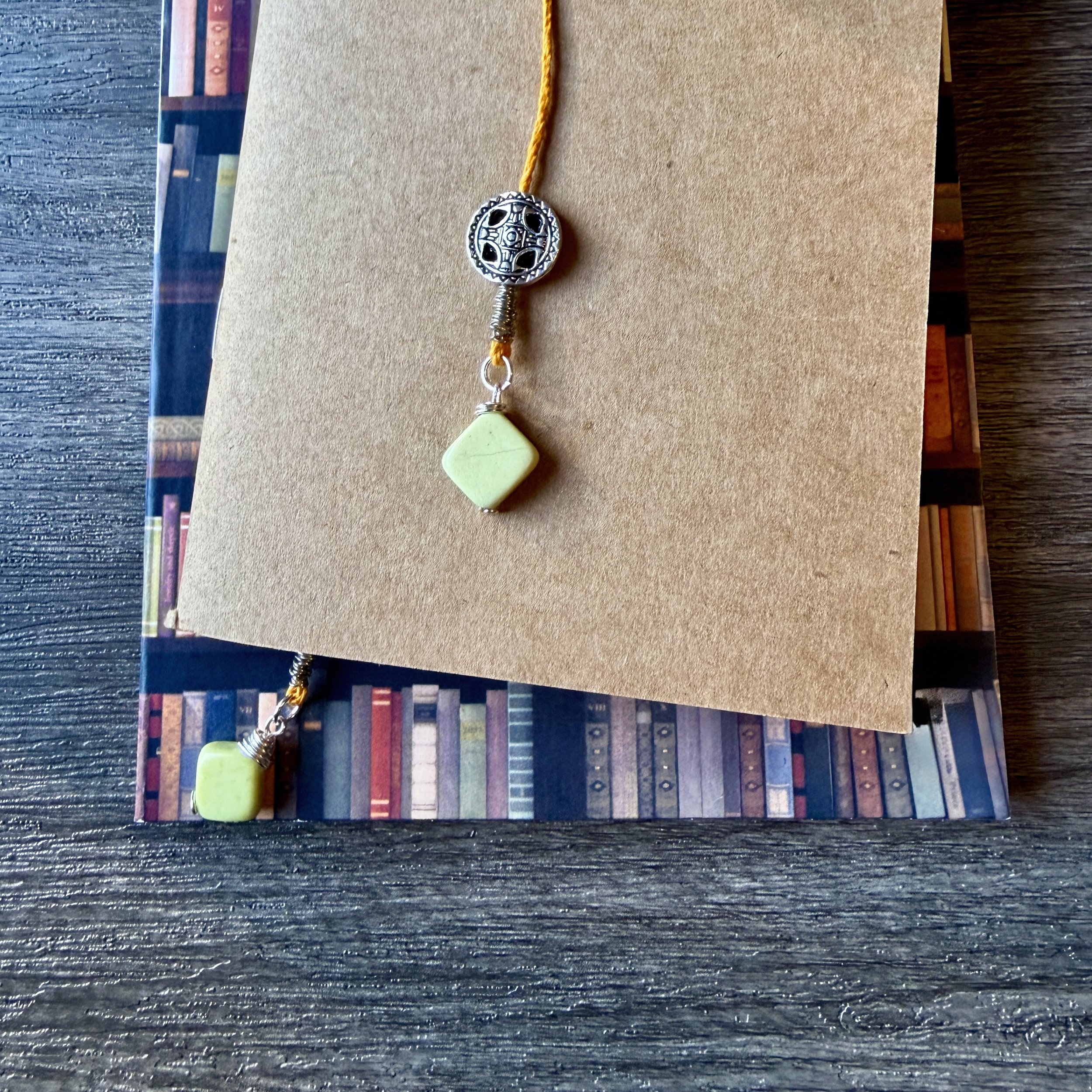 Yellow gold hemp cord and spring green jasper bookmark with silver accents