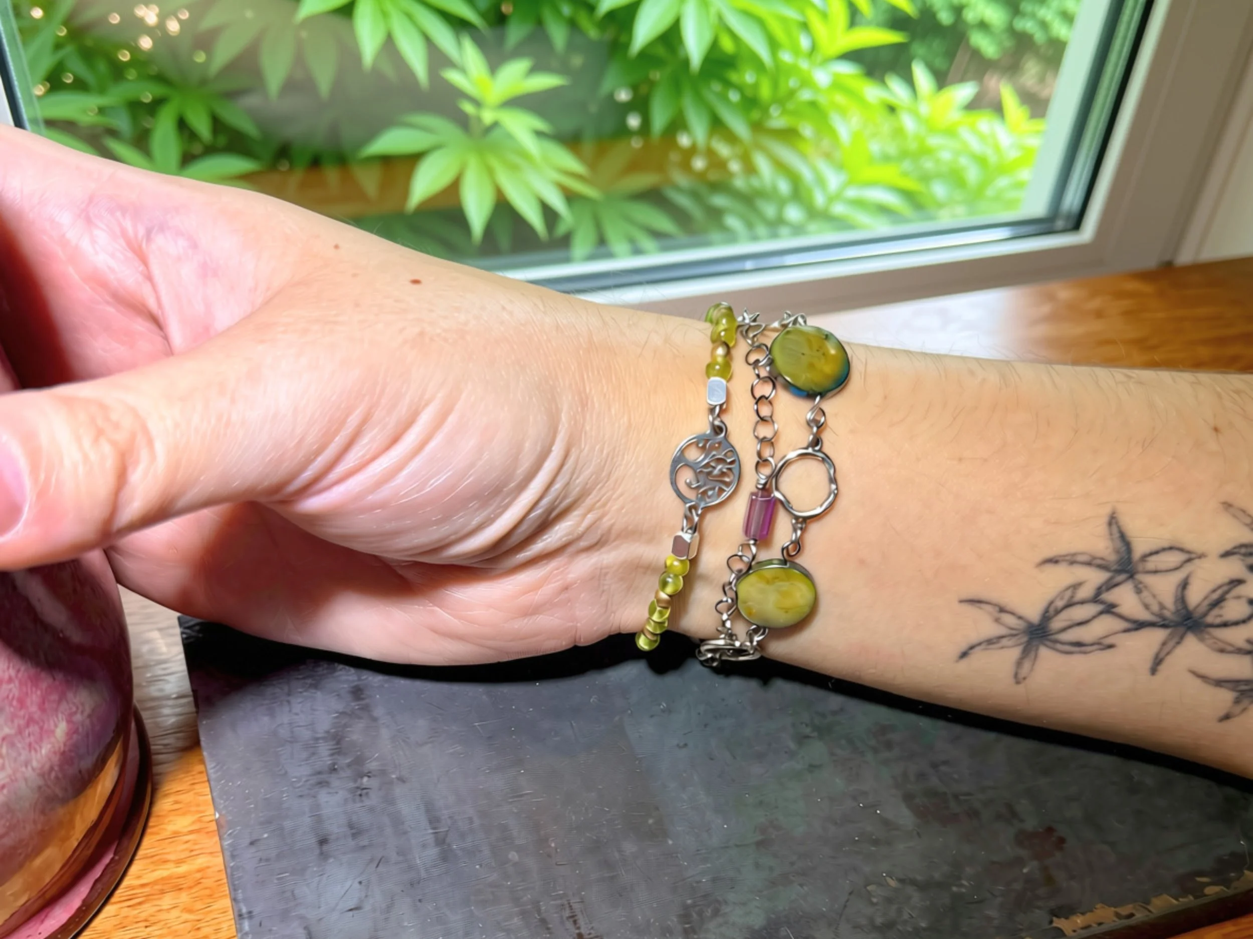 Olive Mother of Pearl & Peridot Multi-Strand Bracelet on wrist