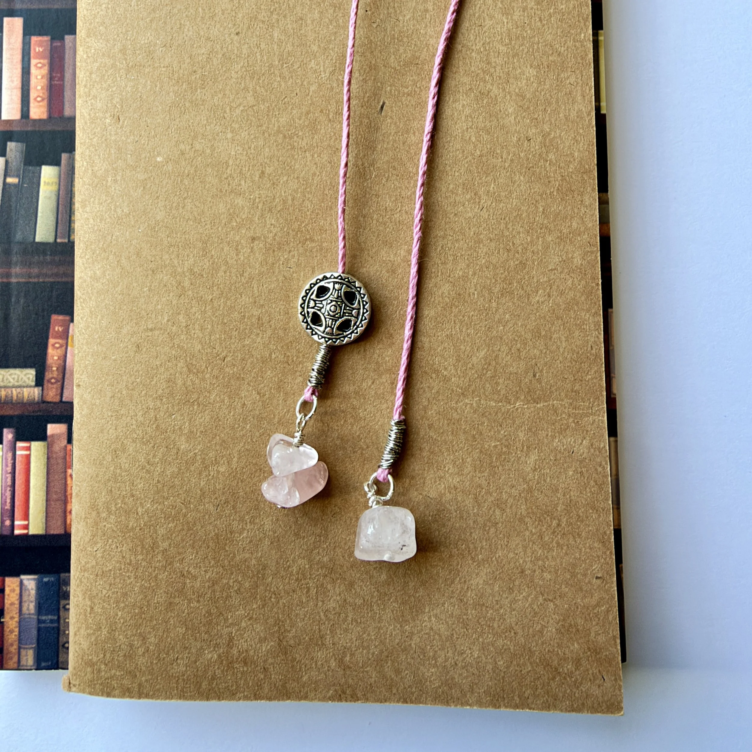 Light pink hemp cord and rose quartz bookmark with silver accents
