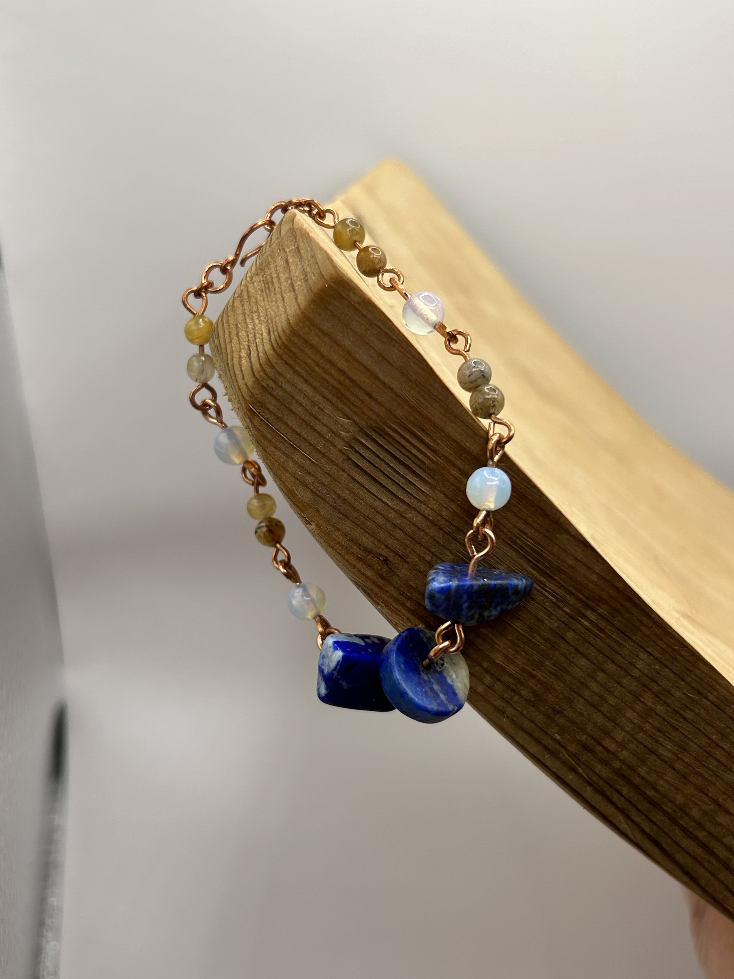 Blue River Lapis Lazuli Nugget Bracelet draped on wood
