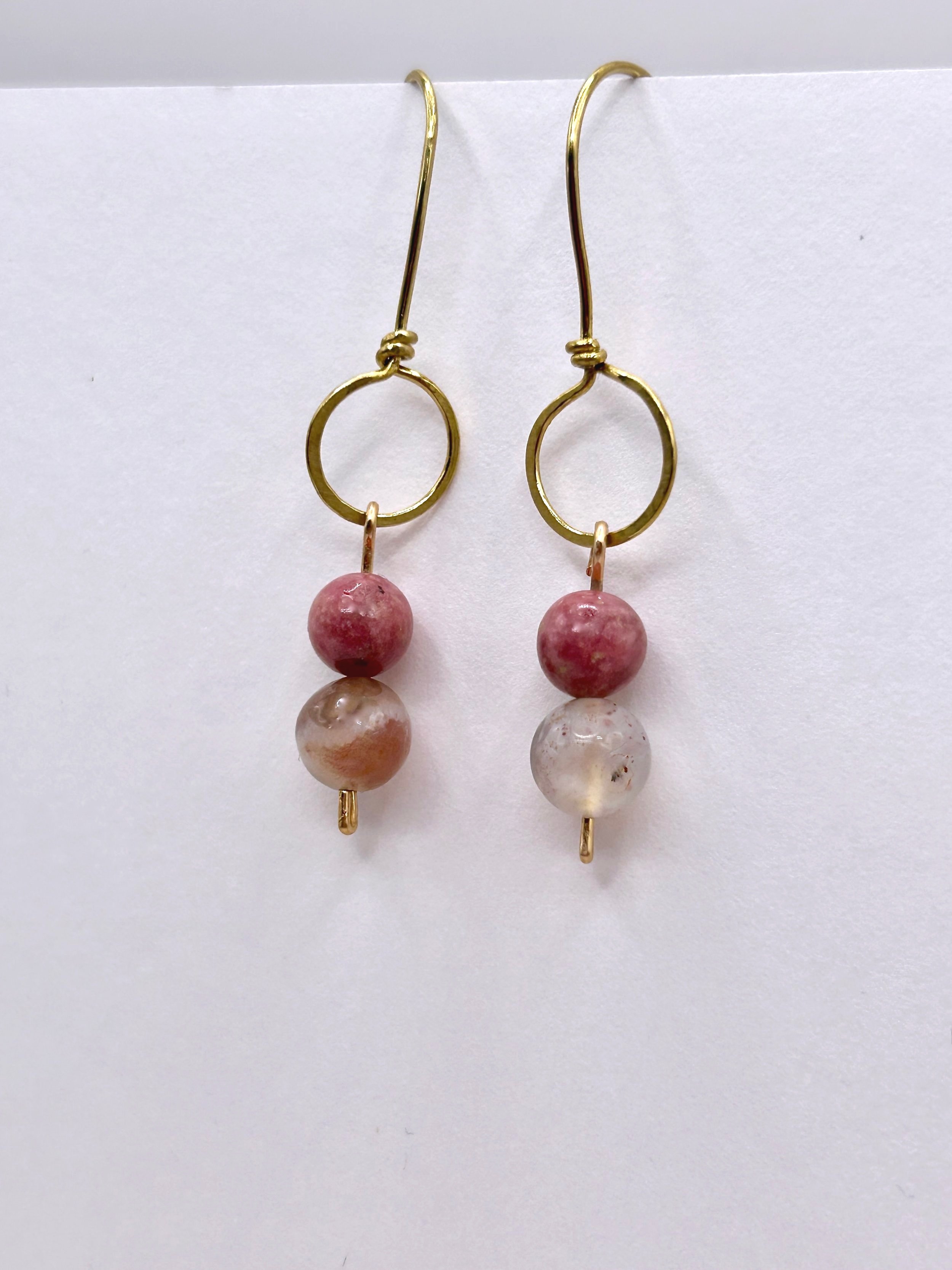 Open Horizon Circle Jeweler's Brass Metal with Pink Rhodonite and Botswana Agate beads on a Drop Earring with Jeweler's Brass ear wires on white background