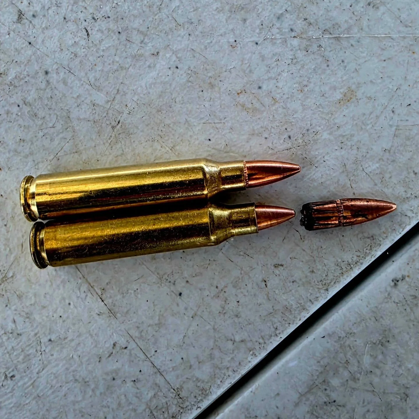 During a recent rifle class, someone in the class began to have malfunctions with the bolt not closing all the way. When one of the rounds was cleared out it was observed that the projectile had been pushed into the casing a bit. The rifle was taken 