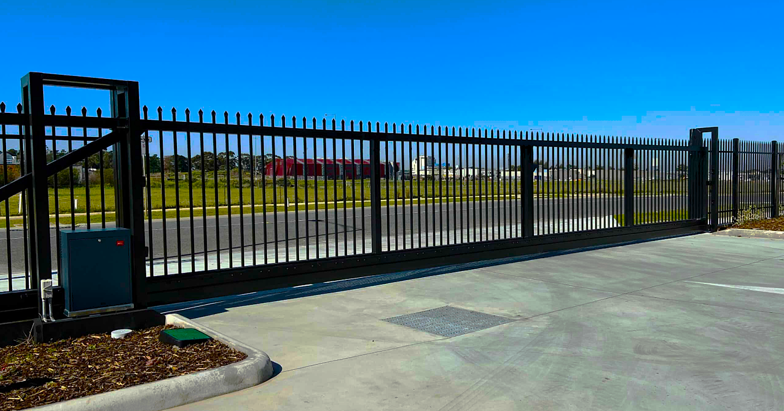 black metal sliding gate in industrial area
