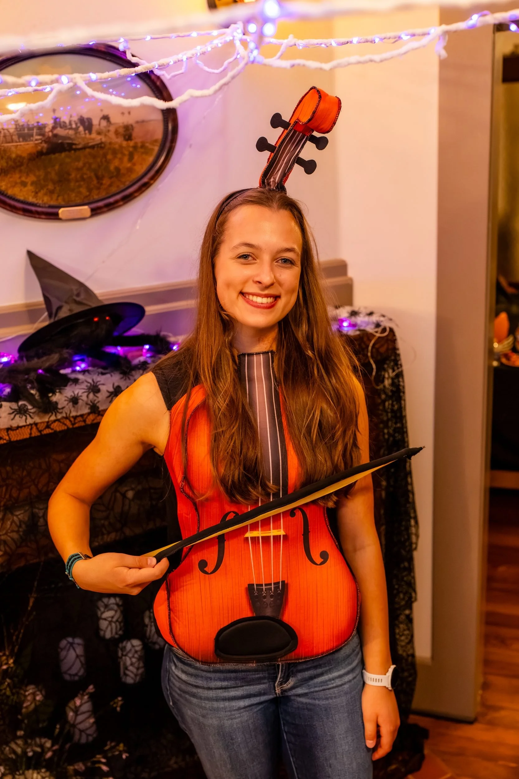 Student wearing a violin costume at the reception