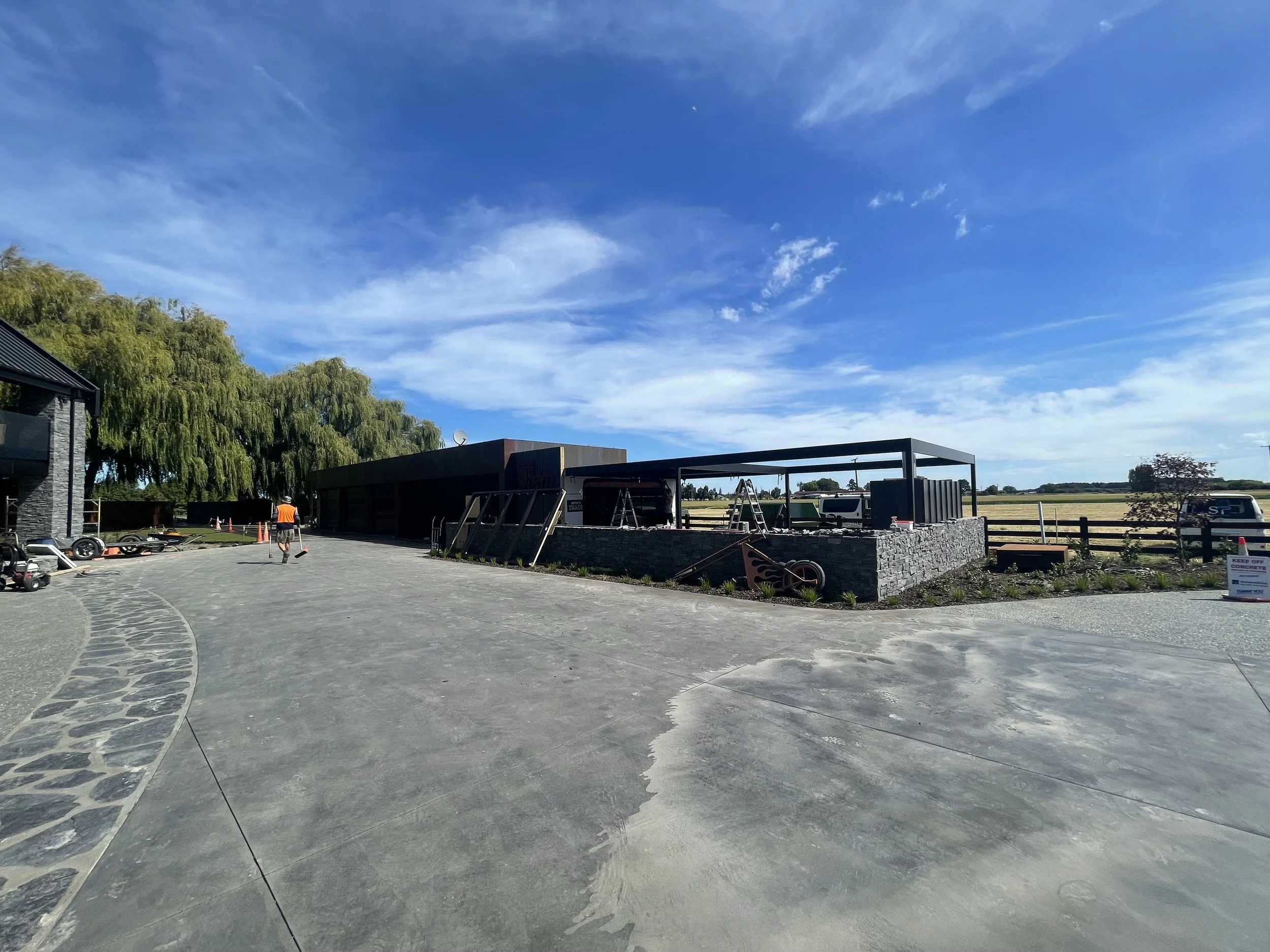 Full restoration and reclad of an old garage with connected outdoor living room by Senna Homes, Christchurch, Selwyn and Canterbury