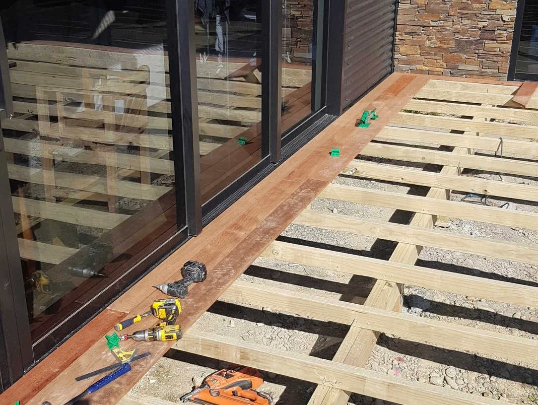 Senna Developments team constructing a Kwila deck as part of a South Island hard landscaping project in Lincoln, Selwyn, of Christchurch.