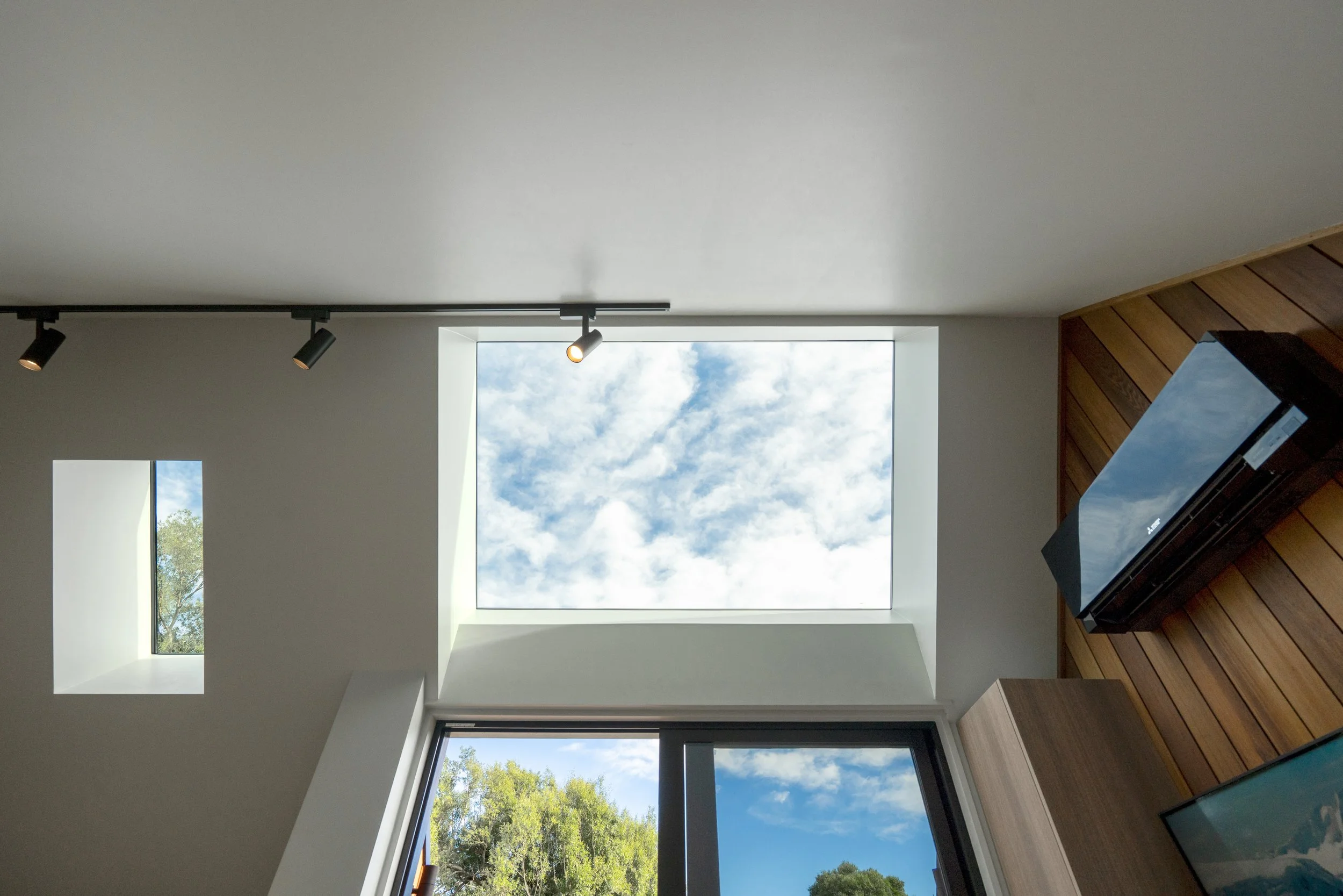 Two Velux skylights create a light filled living space within the Living Pod retreat.