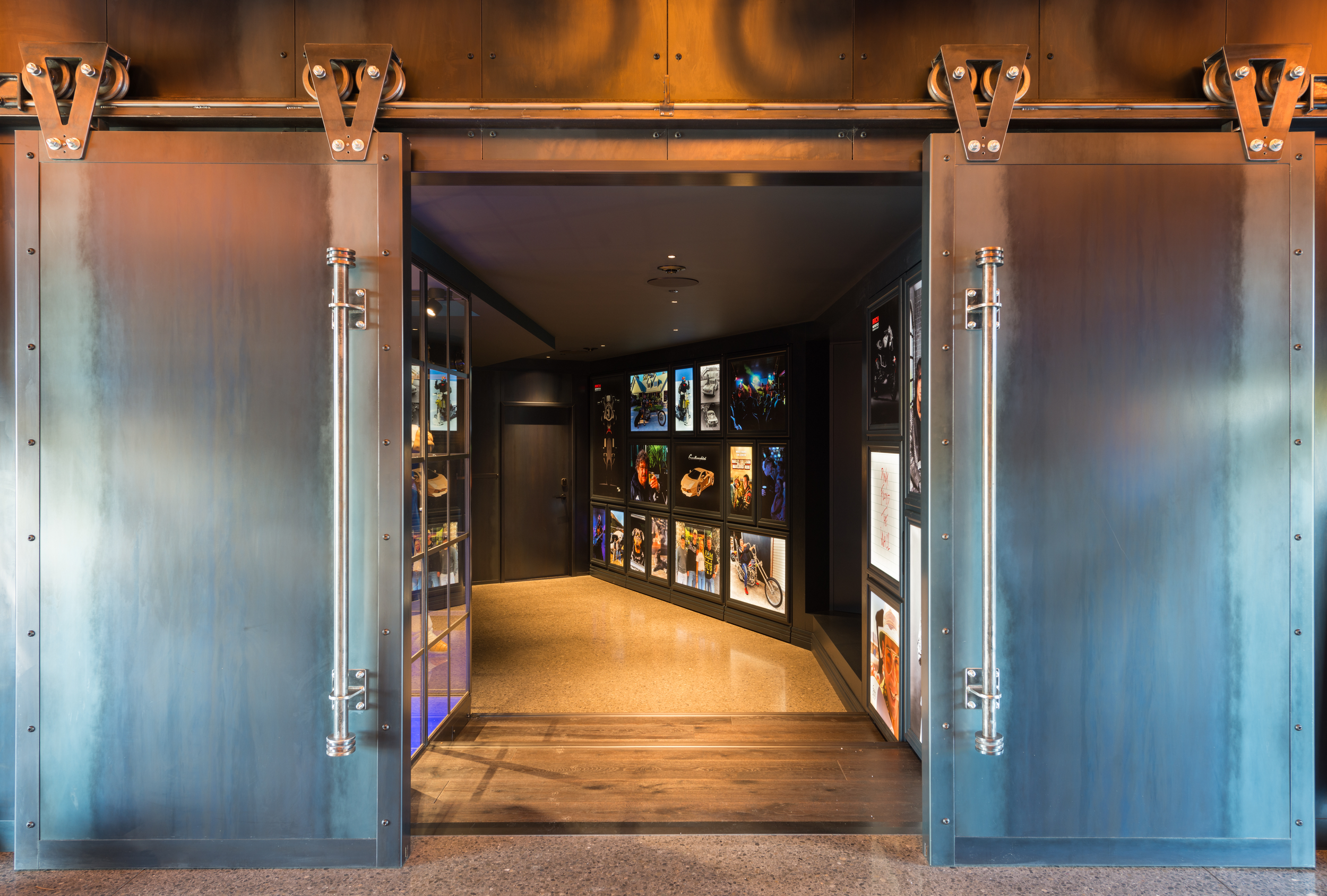 Bespoke steel barn door entrance to a man cave extension by Senna Developments, Christchurch and Canterbury.
